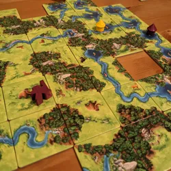 A close up of the board game Carcassonne: Hunters and Gatherers