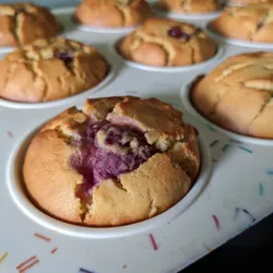 Vegan raspberry muffins in a tin