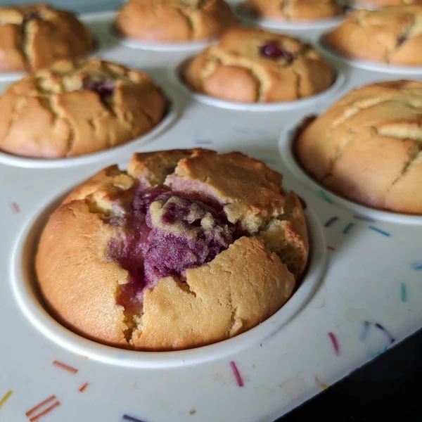 Vegan raspberry muffins in a tin